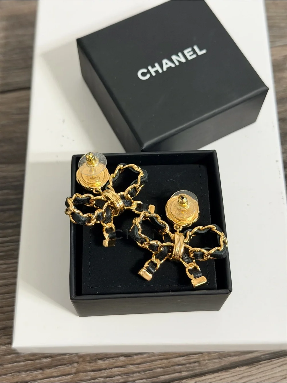 CHANEL Leather Bow CC Gold Dangle Earrings